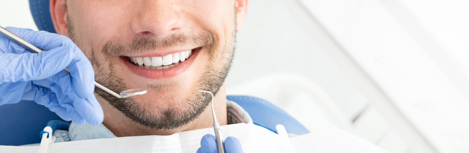 bigstock-Young-Man-At-The-Dentist-Dent-316433872-scaled-e1582238620639
